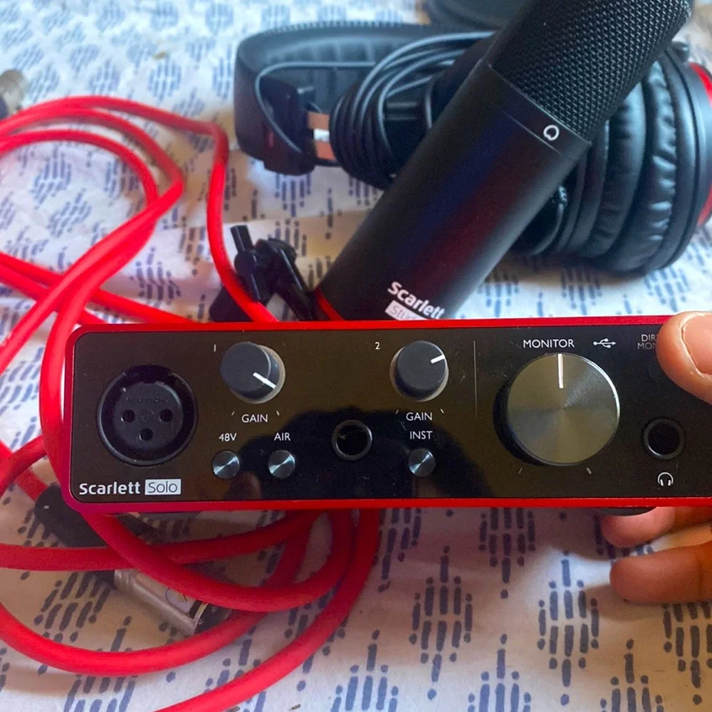 scarlett interface, headset, and microphone. color red. brand new, opened box.